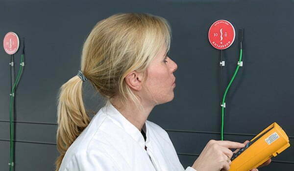 Worker reading heat flux sensor